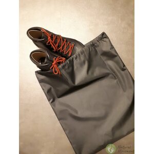Topi Natural Shoe care products packed in a shoe bag